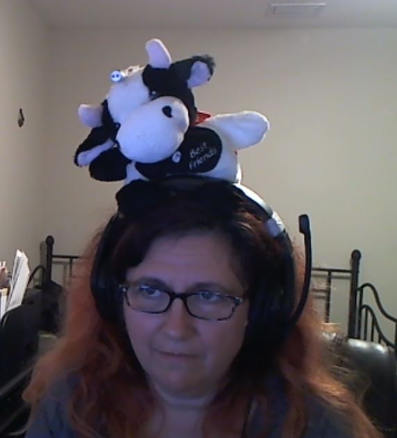 Karina wearing a laser cow on her head